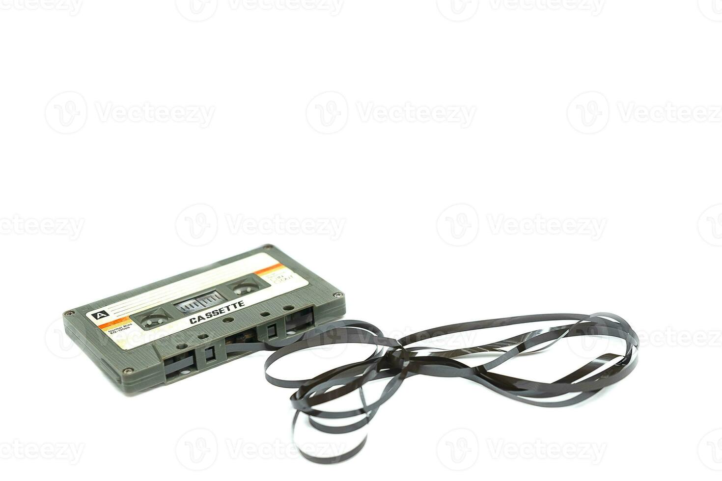 Vintage compact cassette tape on white background photo
