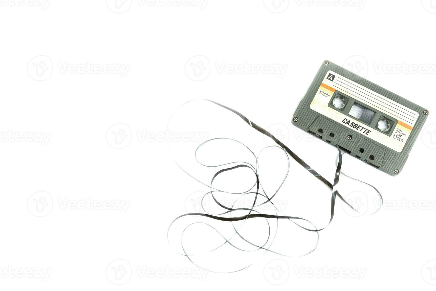 Vintage compact cassette tape on white background photo