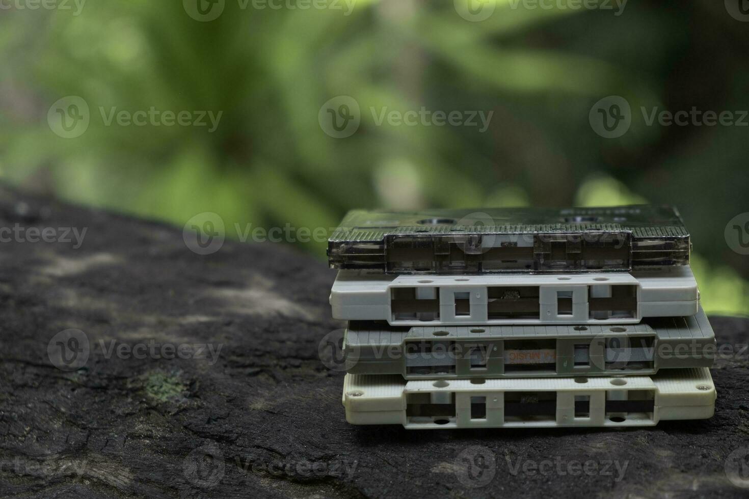 Compact cassette on table background photo