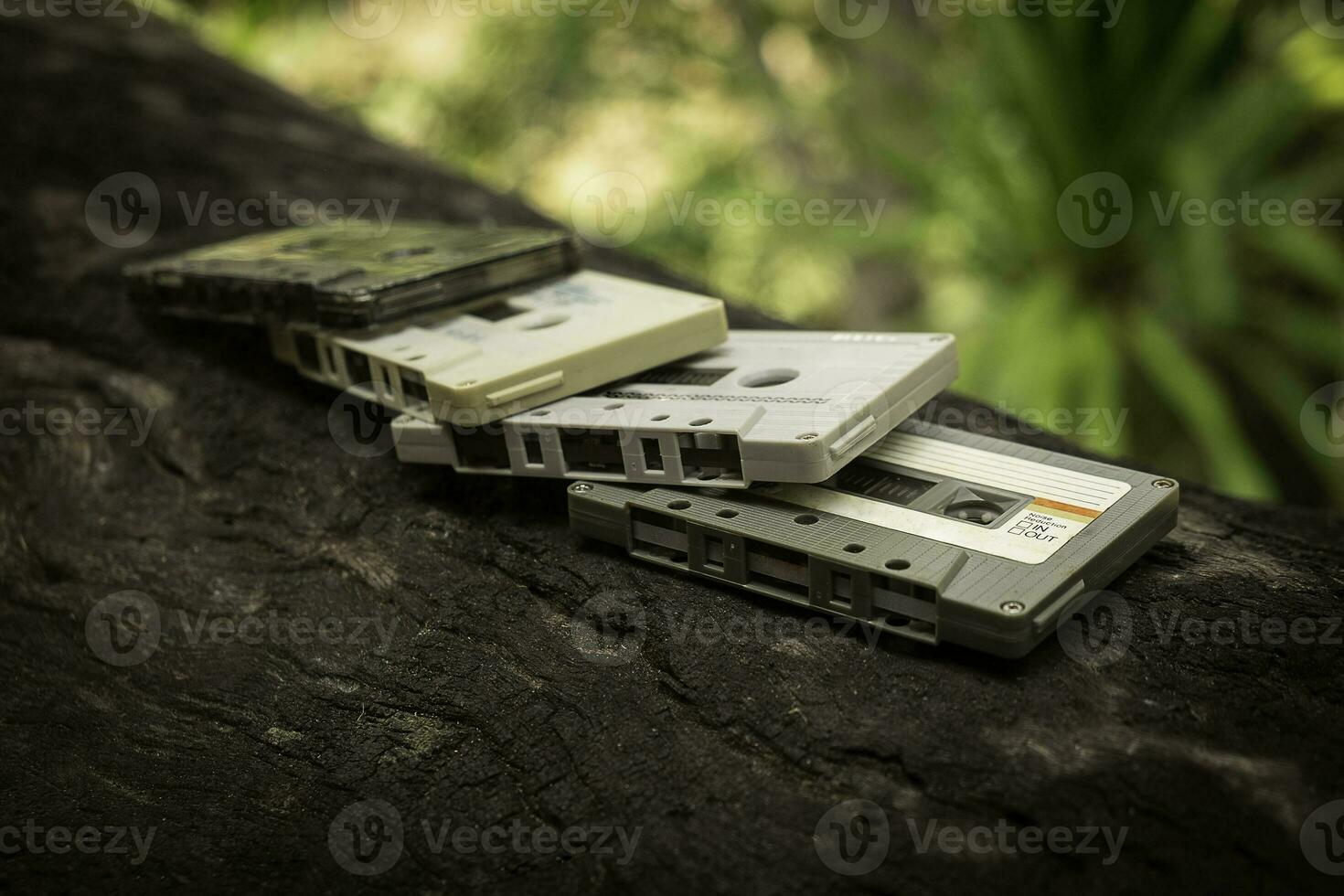 Compact cassette on table background photo