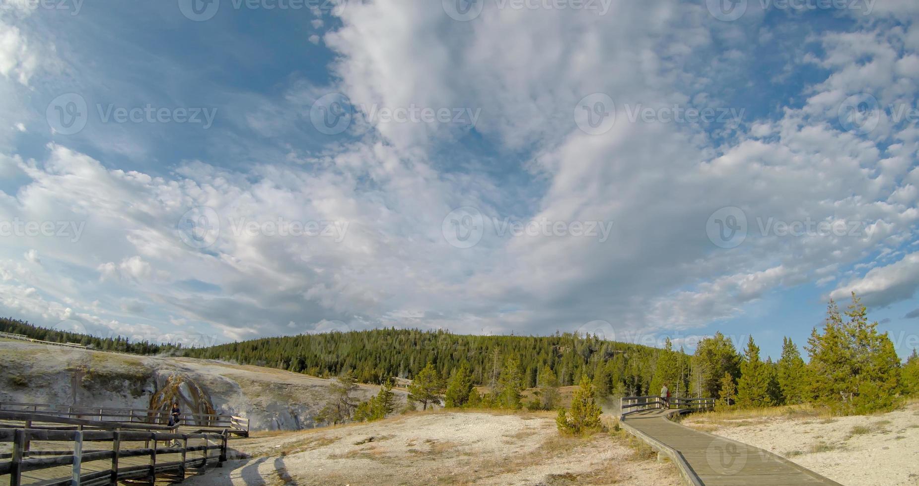 Old Faithful geysersac at Yellowstone National Park photo