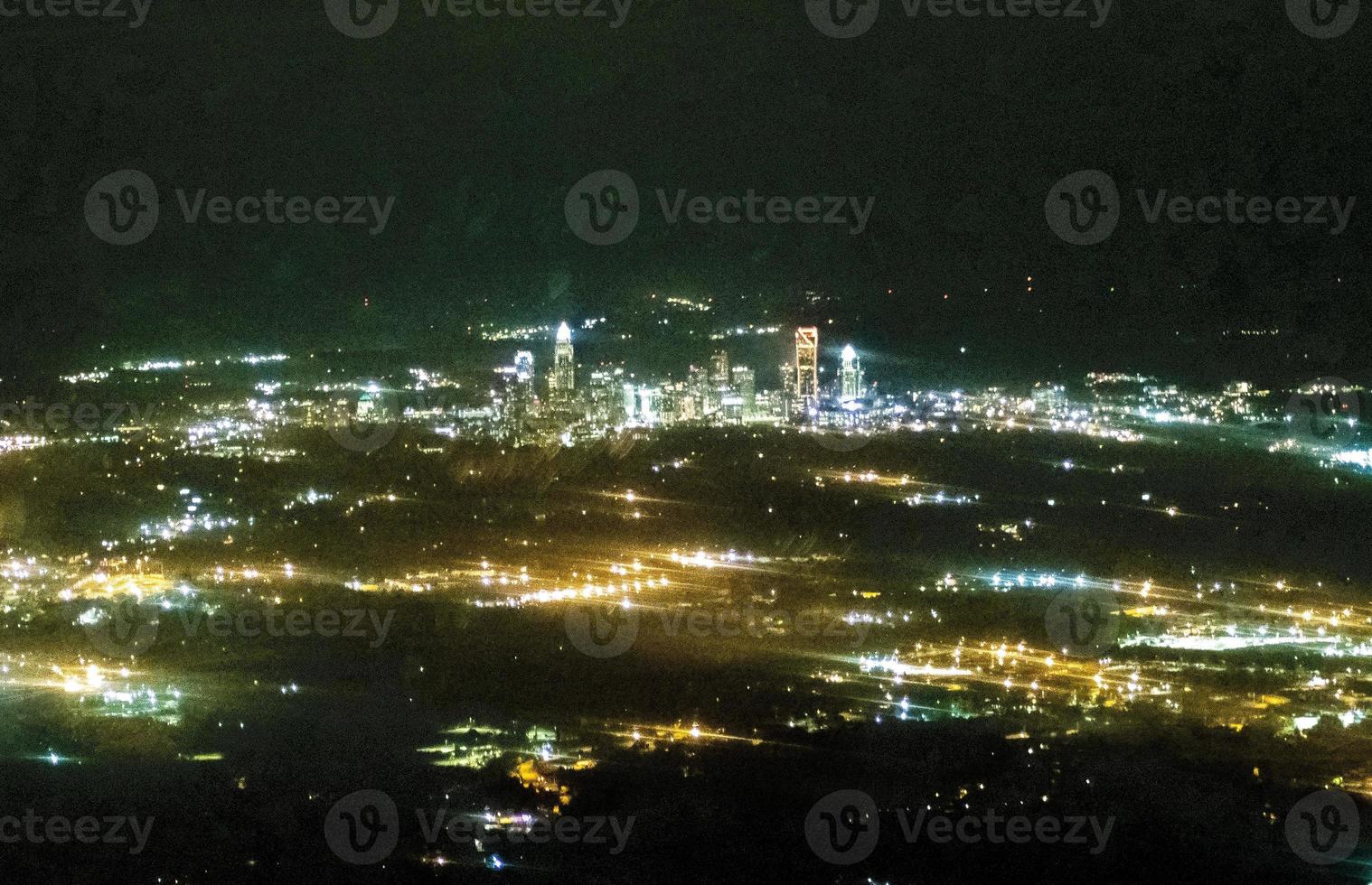 Abstract night view of charlotte nc downtown from airplane photo