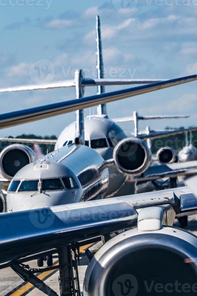 busy airport tarmac traffic before airplanes take off photo