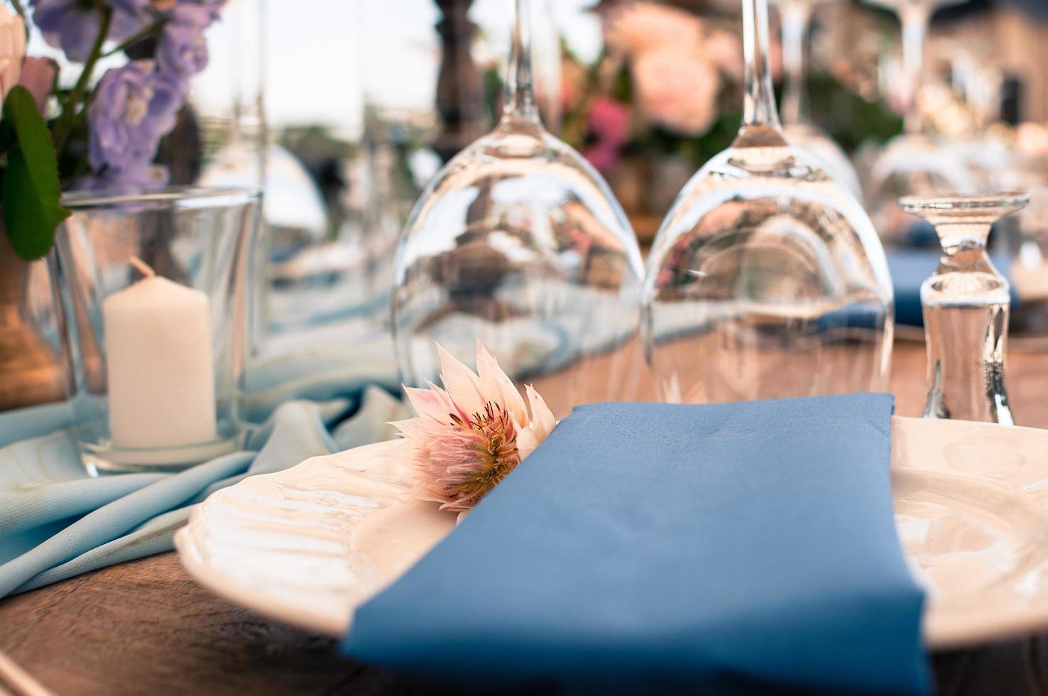 Wedding or event decoration table setup, blue clolor photo