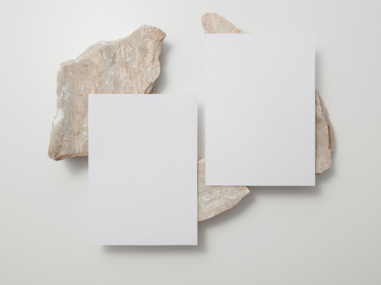 Invitation card mockup, blank greeting card template. Flat lay photo