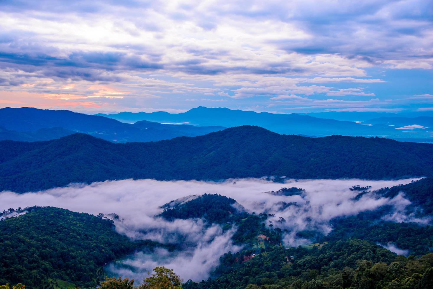 Misty morning sunrise at Doi Mon Ngao Viewpoint in Chiang mai,Thailand photo