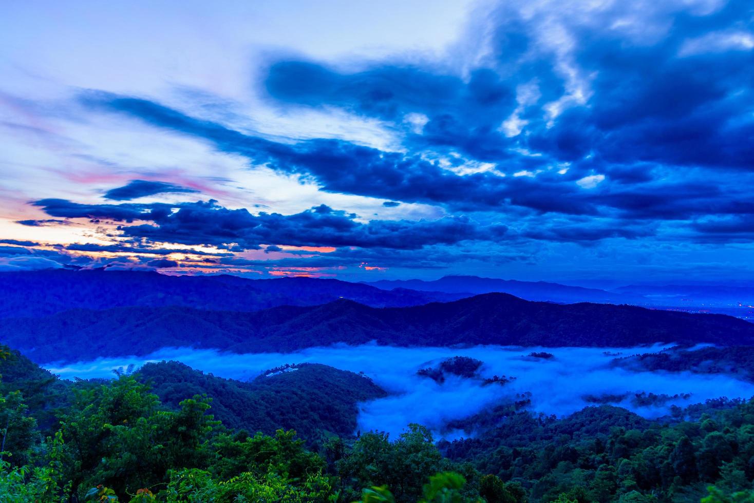 Misty morning sunrise at Doi Mon Ngao Viewpoint in Chiang mai,Thailand photo