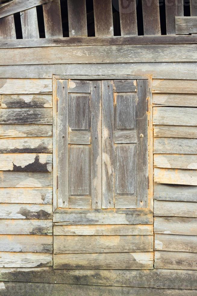 Textura de la pared de la casa de madera vieja de estilo asiático. foto