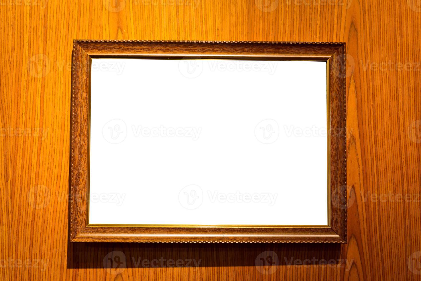 picture frames with blank space isolated on wooden background photo