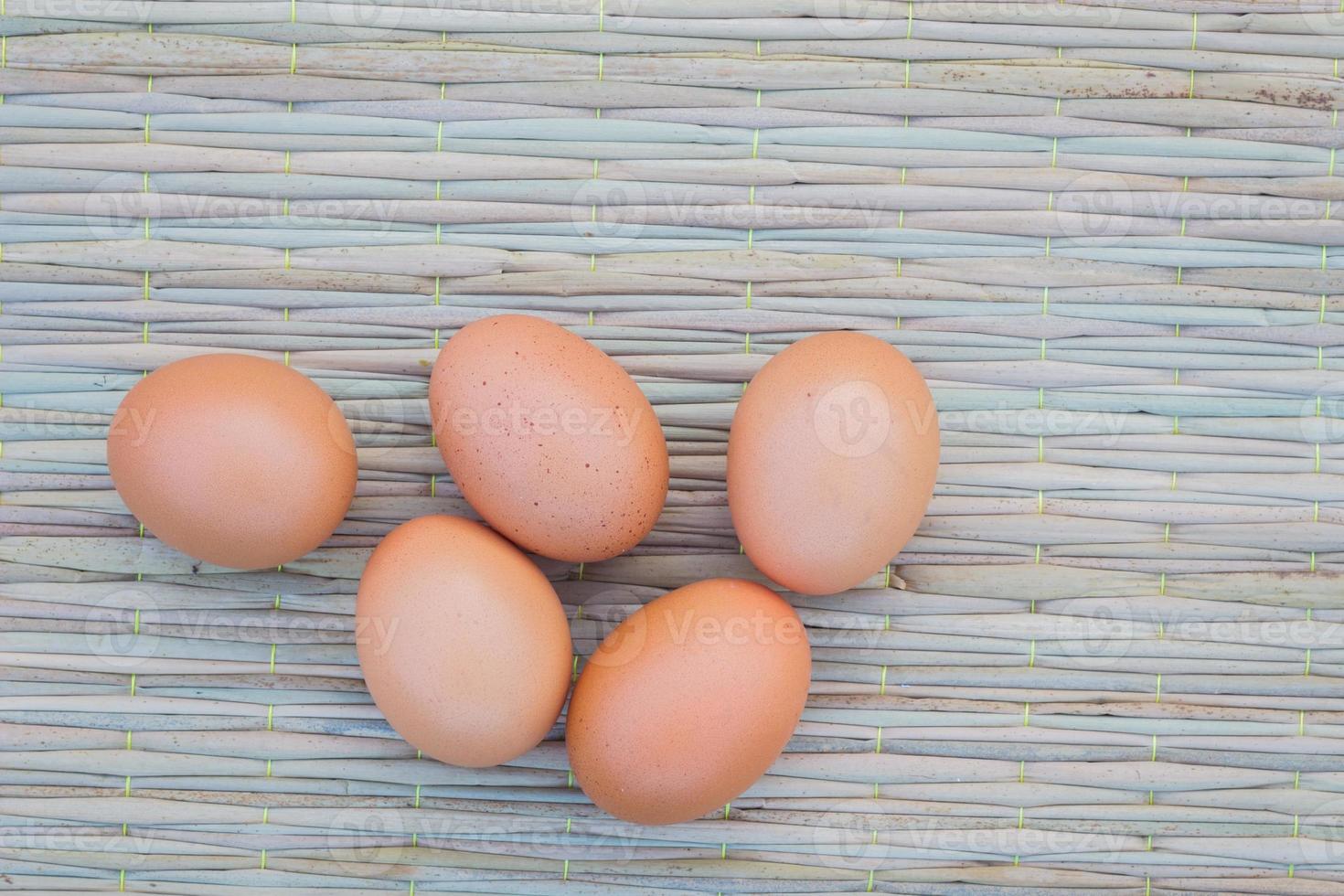 eggs on thai traditional mat photo