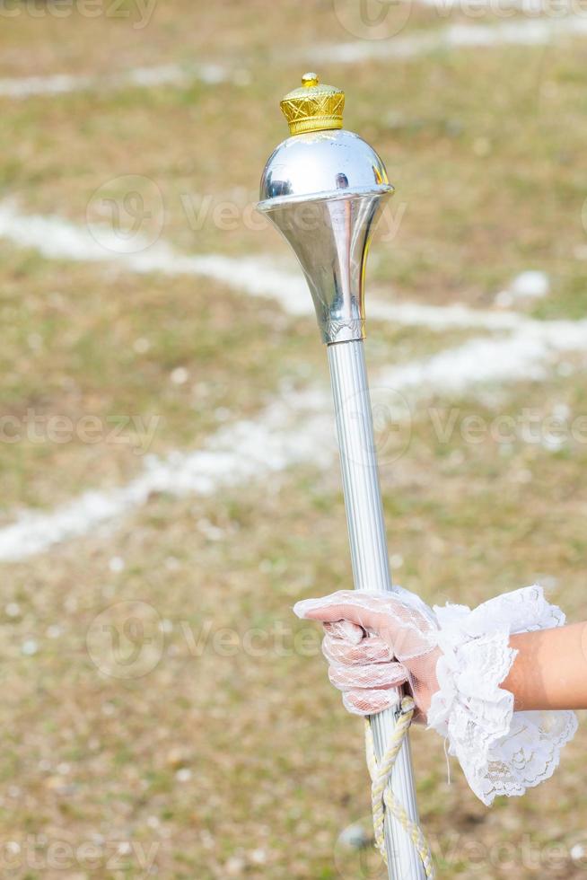 White Gloved Hand Holding Mace photo