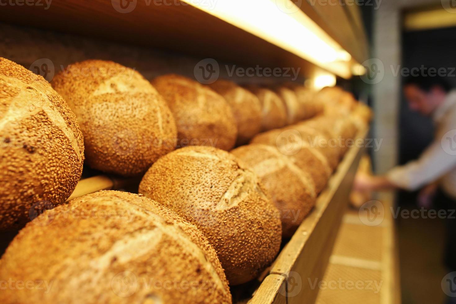 Sequential walnut bread on the shelves, Pastry, Patisserie and Bakery photo