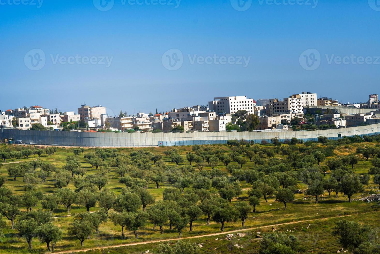 Israeli security fence near Jerusalem separating territory. photo