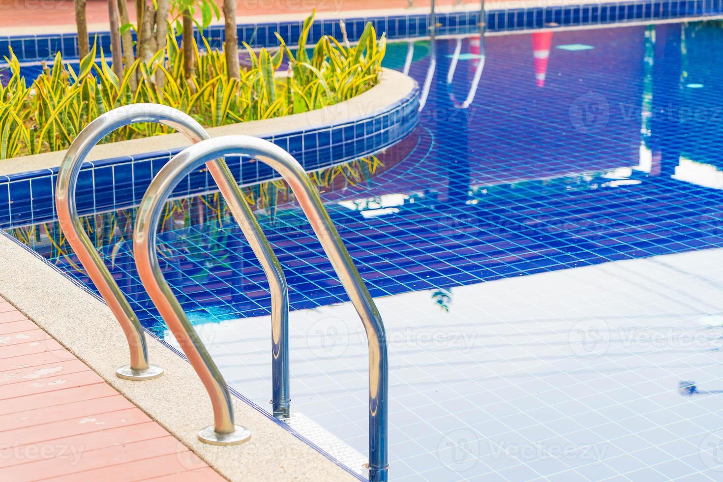 Stair swimming pool in beautiful luxury hotel pool resort photo