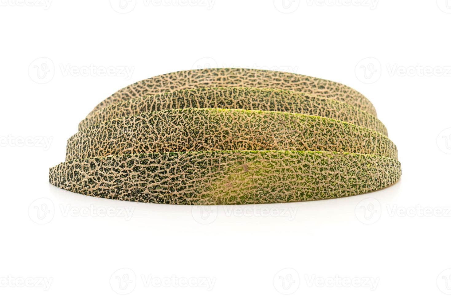 Melón cantalupo sobre fondo blanco. foto