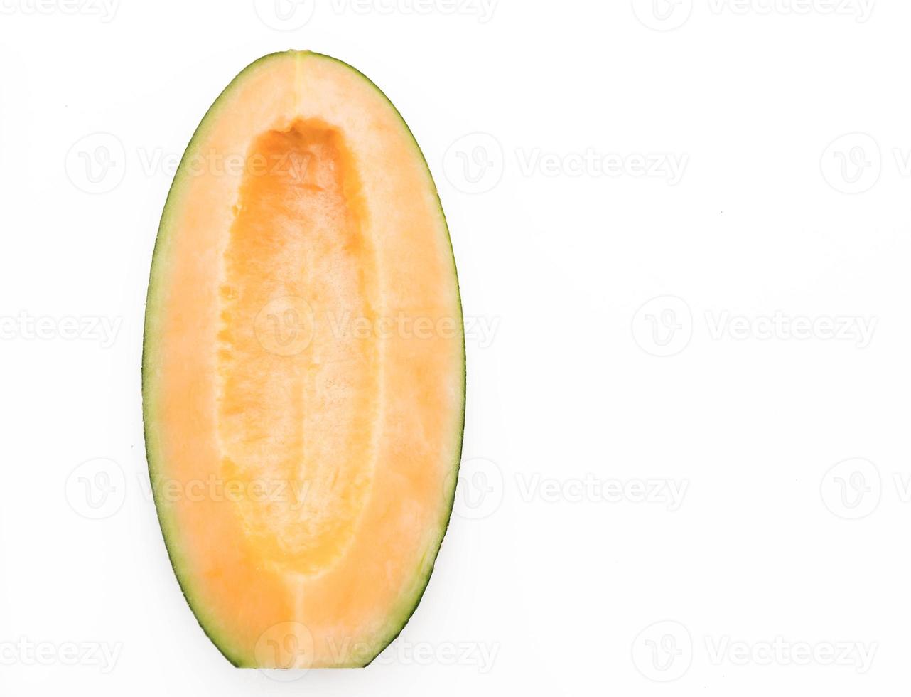 Melón cantalupo sobre fondo blanco. foto