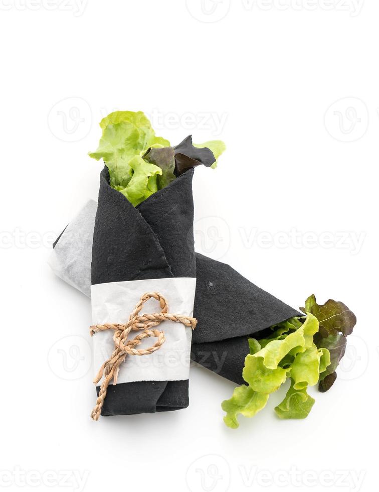 Wrap salad roll on white background photo