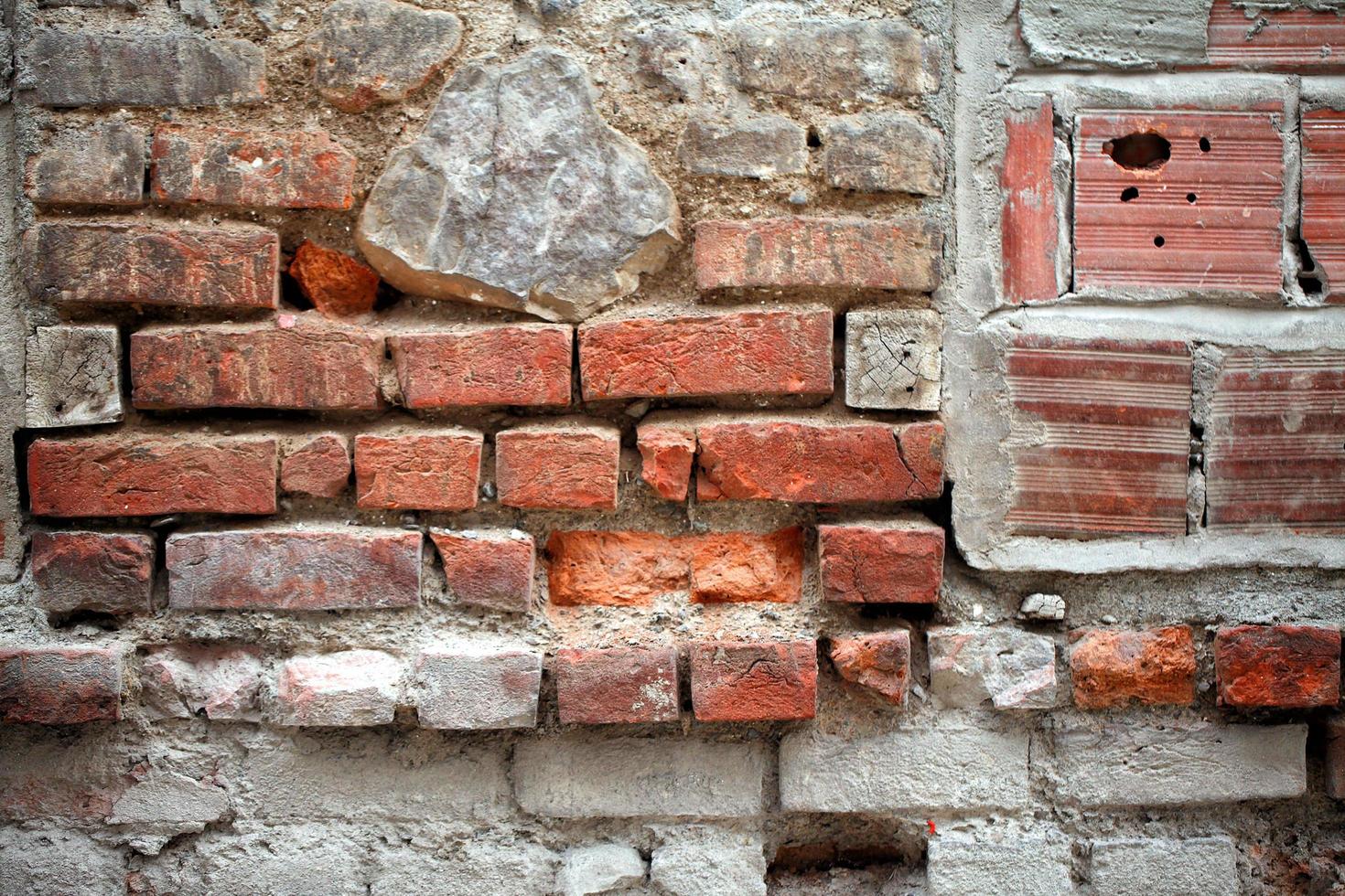 Textura de fondo de pared de ladrillo de piedra grunge foto