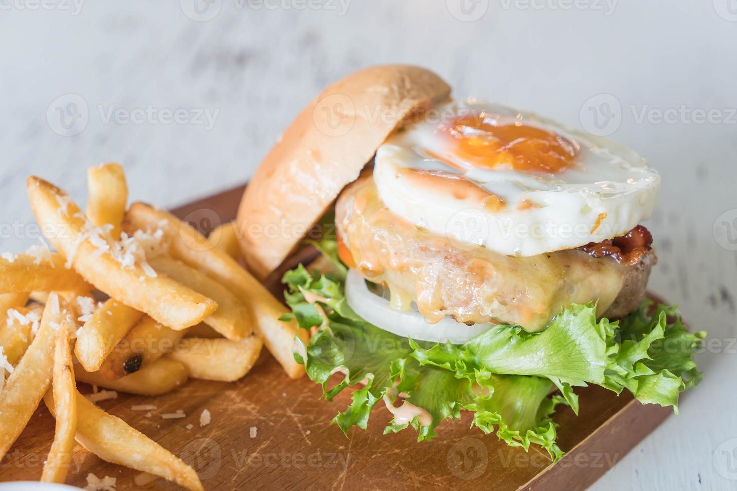 Cheese pork hamburger with french fries photo