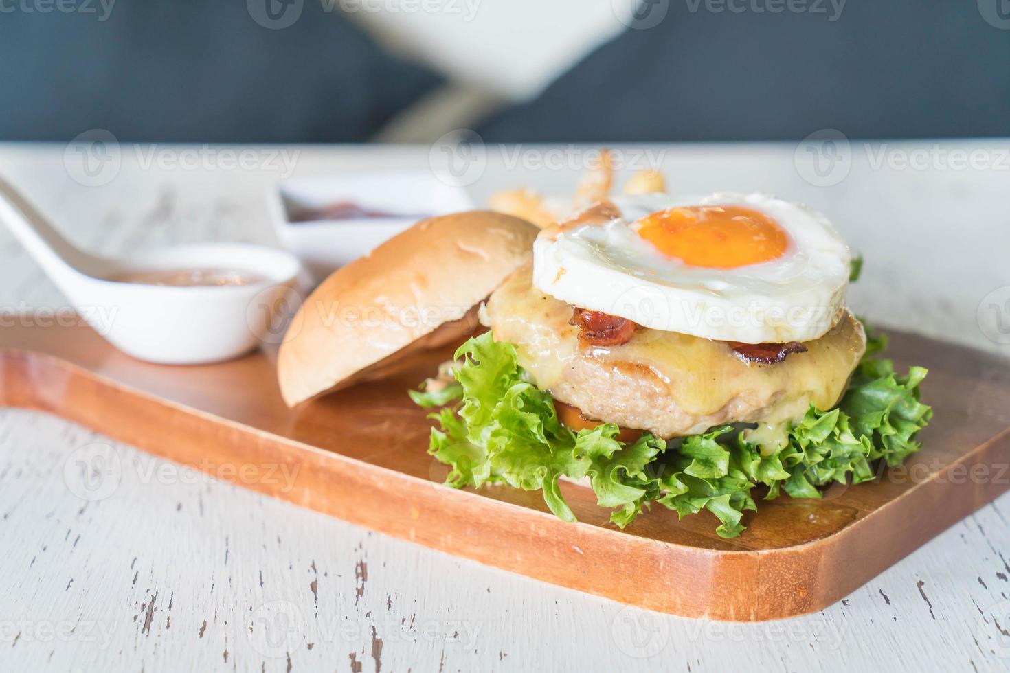 Cheese pork hamburger with french fries photo