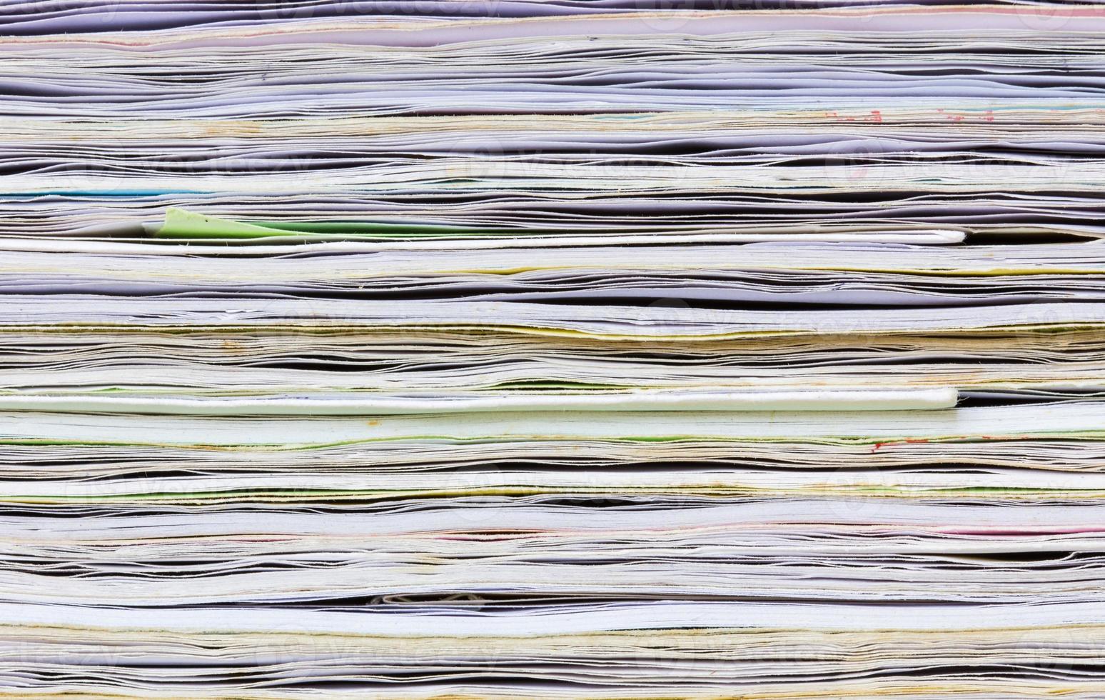 close-up of old colorful notebook spine photo