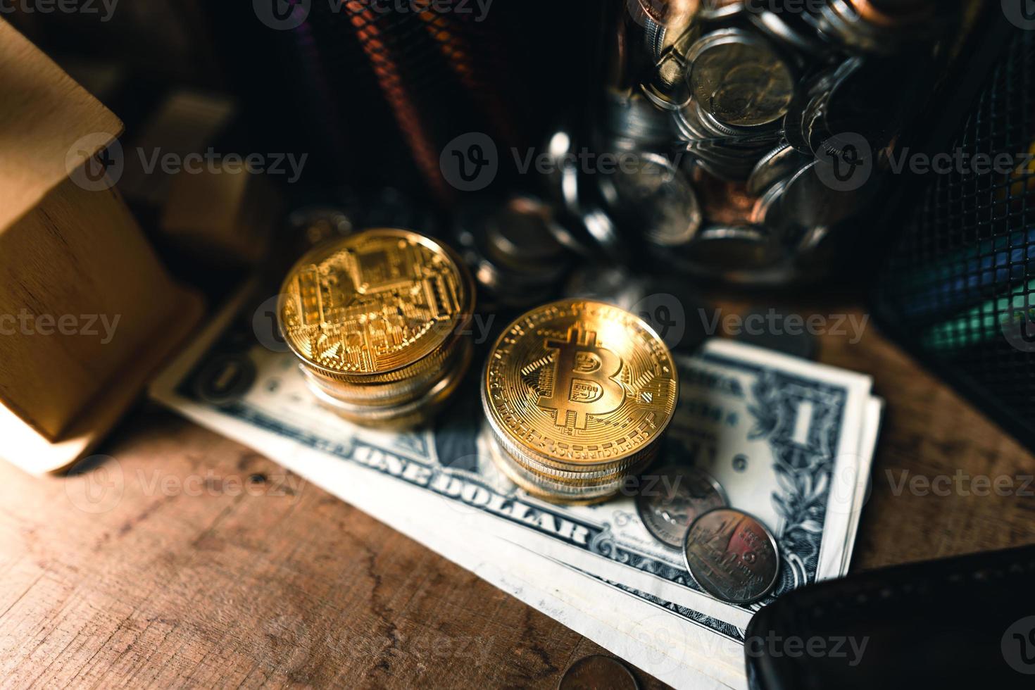 Bitcoin coins on a wooden desk photo