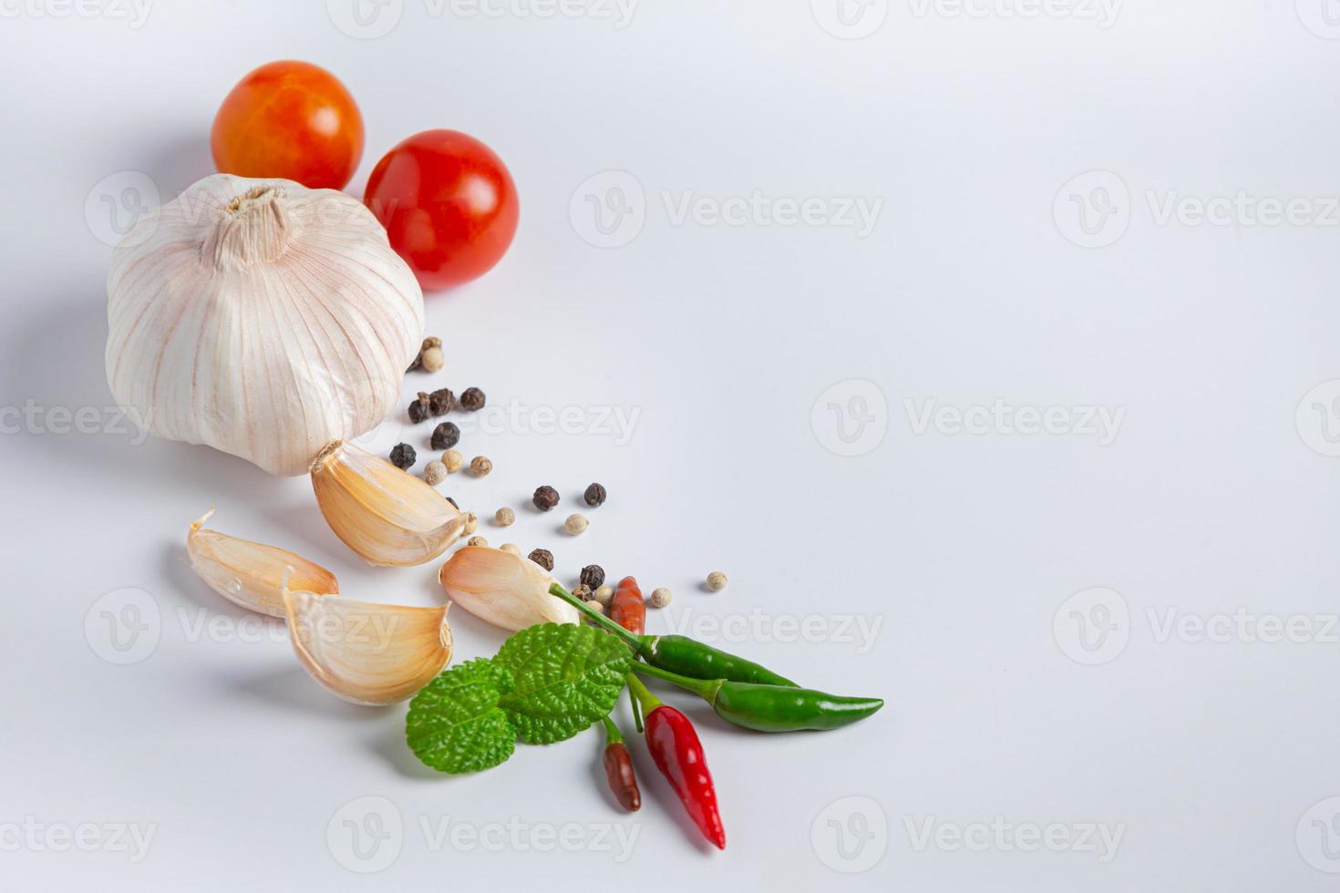 garlic spices on a white background photo