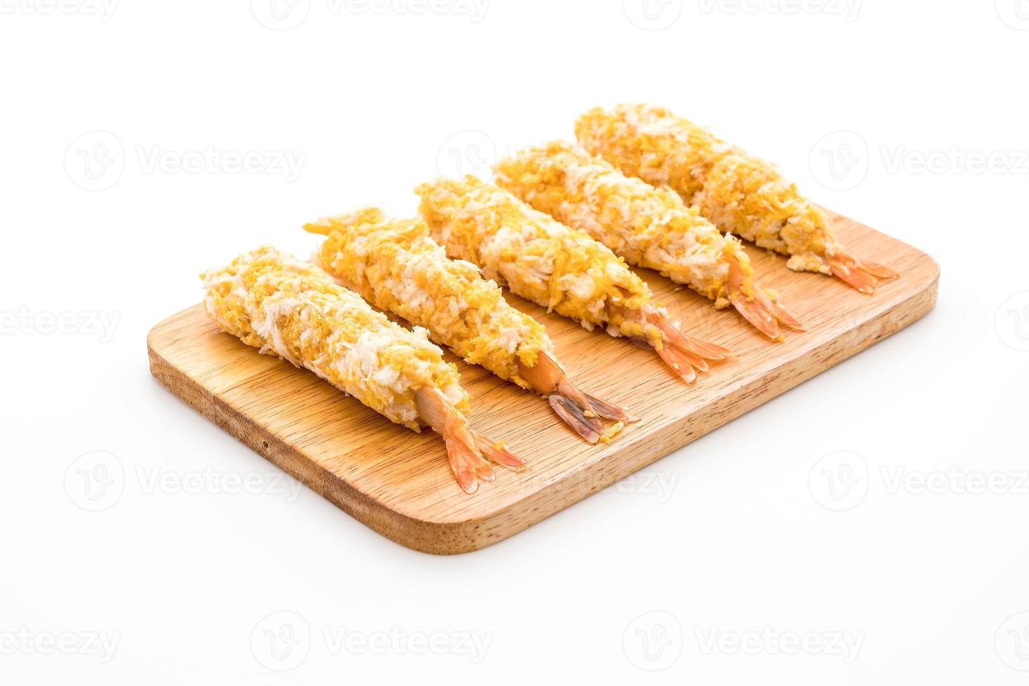 Batter-fried prawns on white background photo