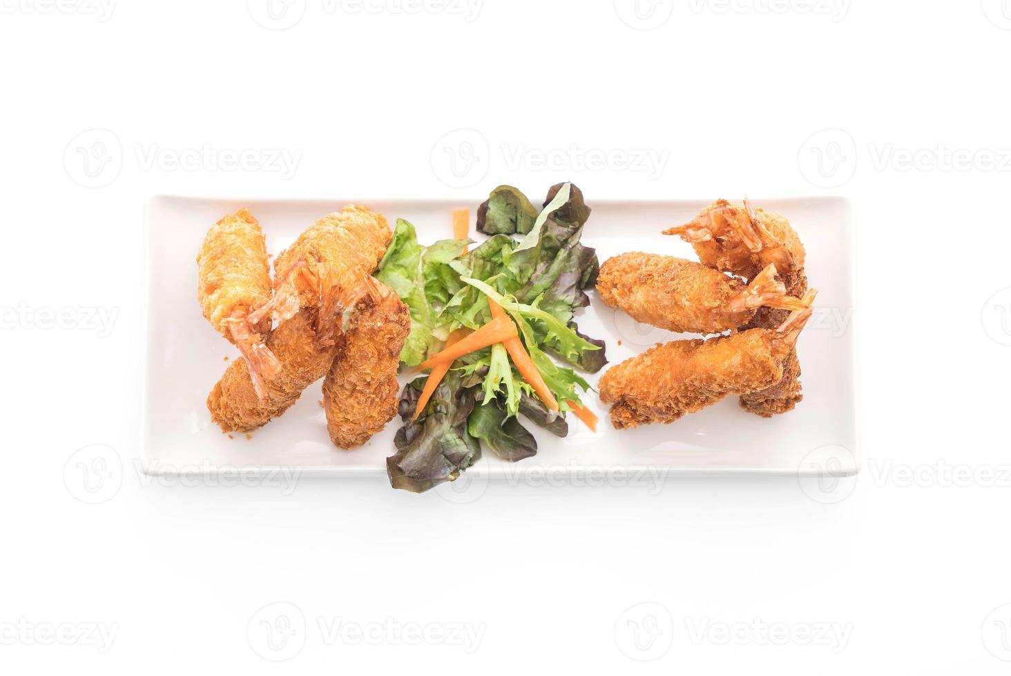 Batter-fried prawns on white background photo