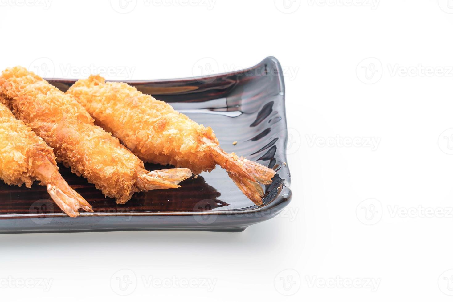 Batter-fried prawns on white background photo