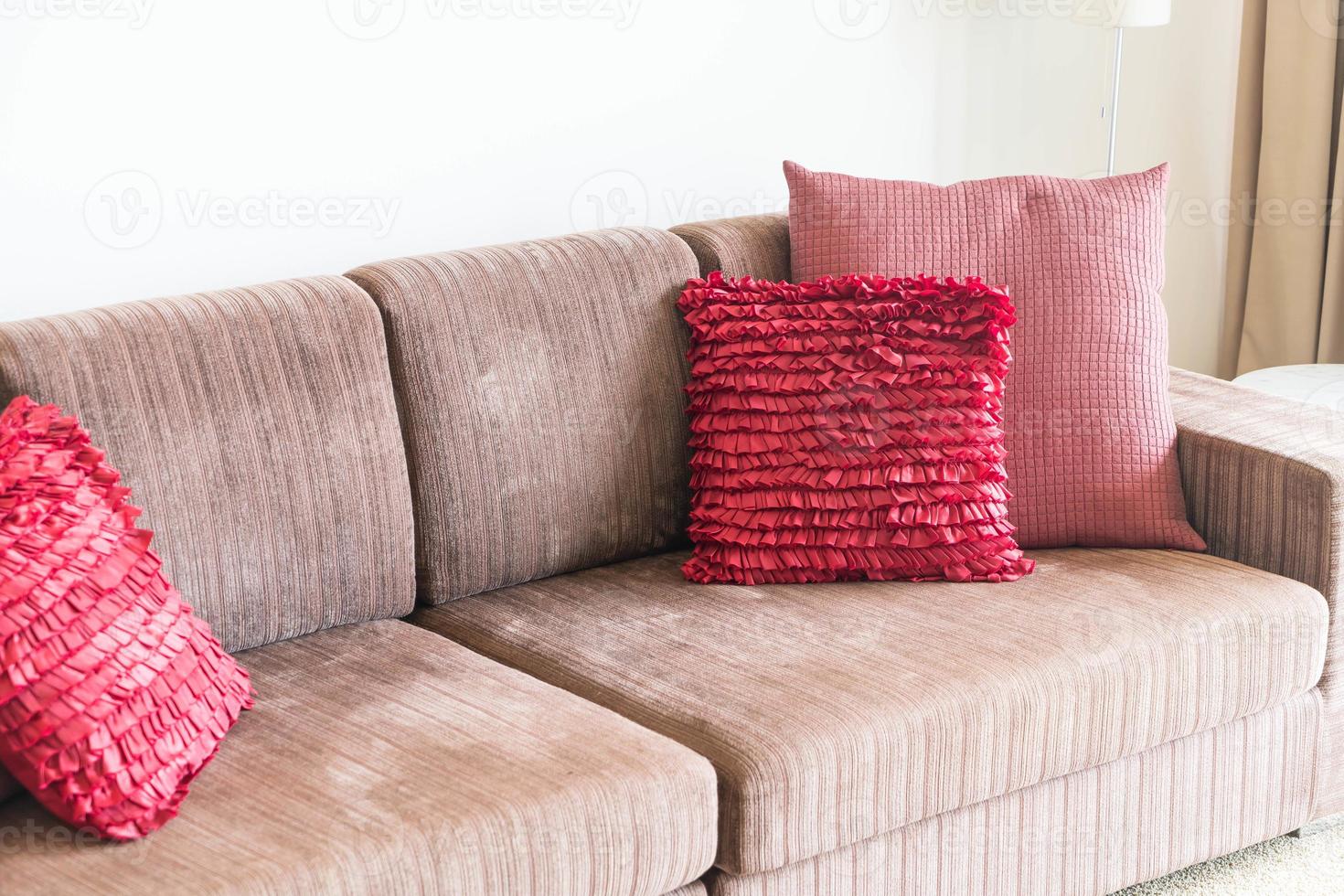 Beautiful pillow on sofa decoration in living room photo