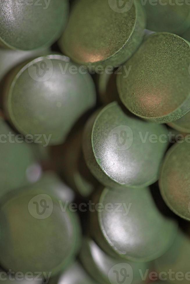 Pastillas de cerca médica espirulina platensis familia de algas algaespace foto