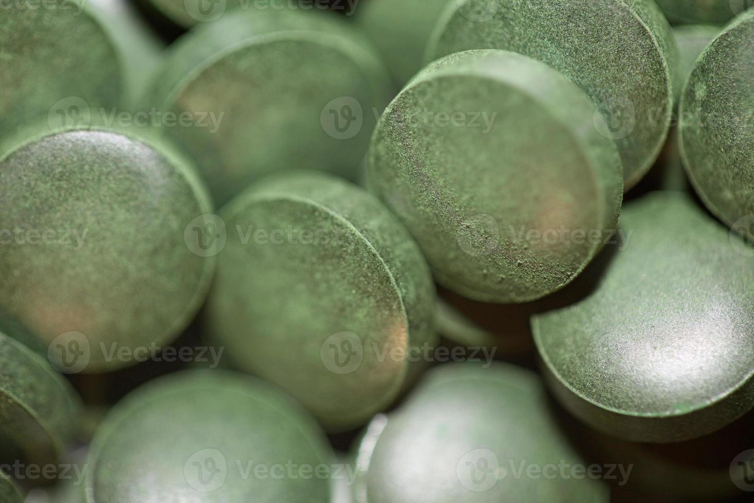 Pastillas de cerca médica espirulina platensis familia de algas algaespace foto