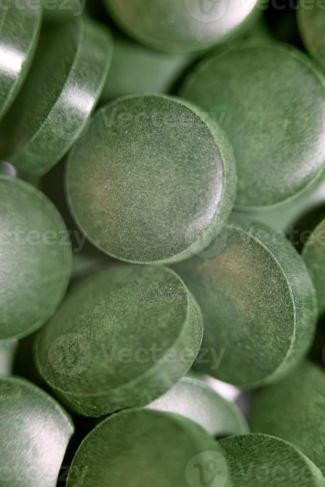 Pastillas de cerca médica espirulina platensis familia de algas algaespace foto