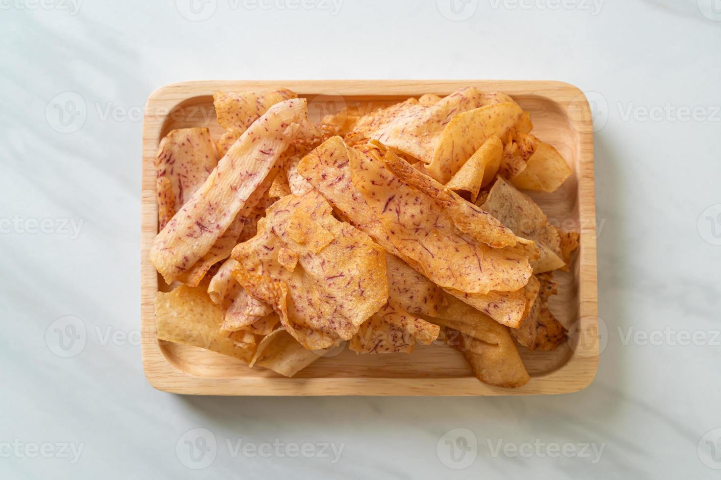 Taro Chips - fried or baked sliced taro photo