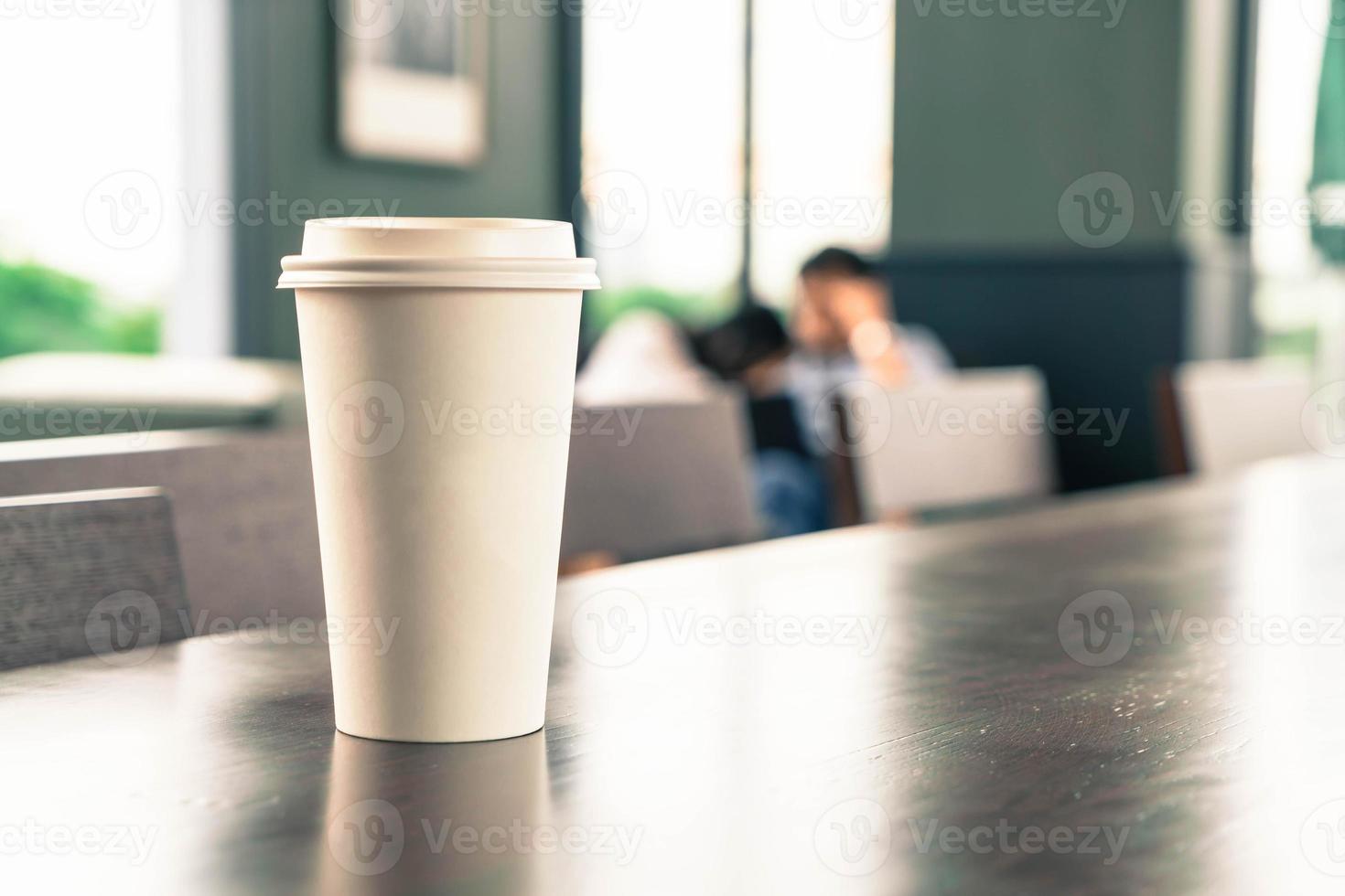 Hot coffee cup in coffee shop photo