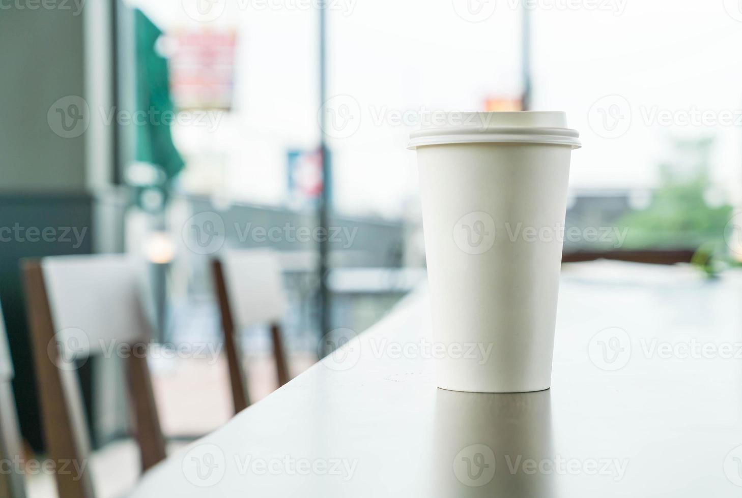 Hot coffee cup in coffee shop photo