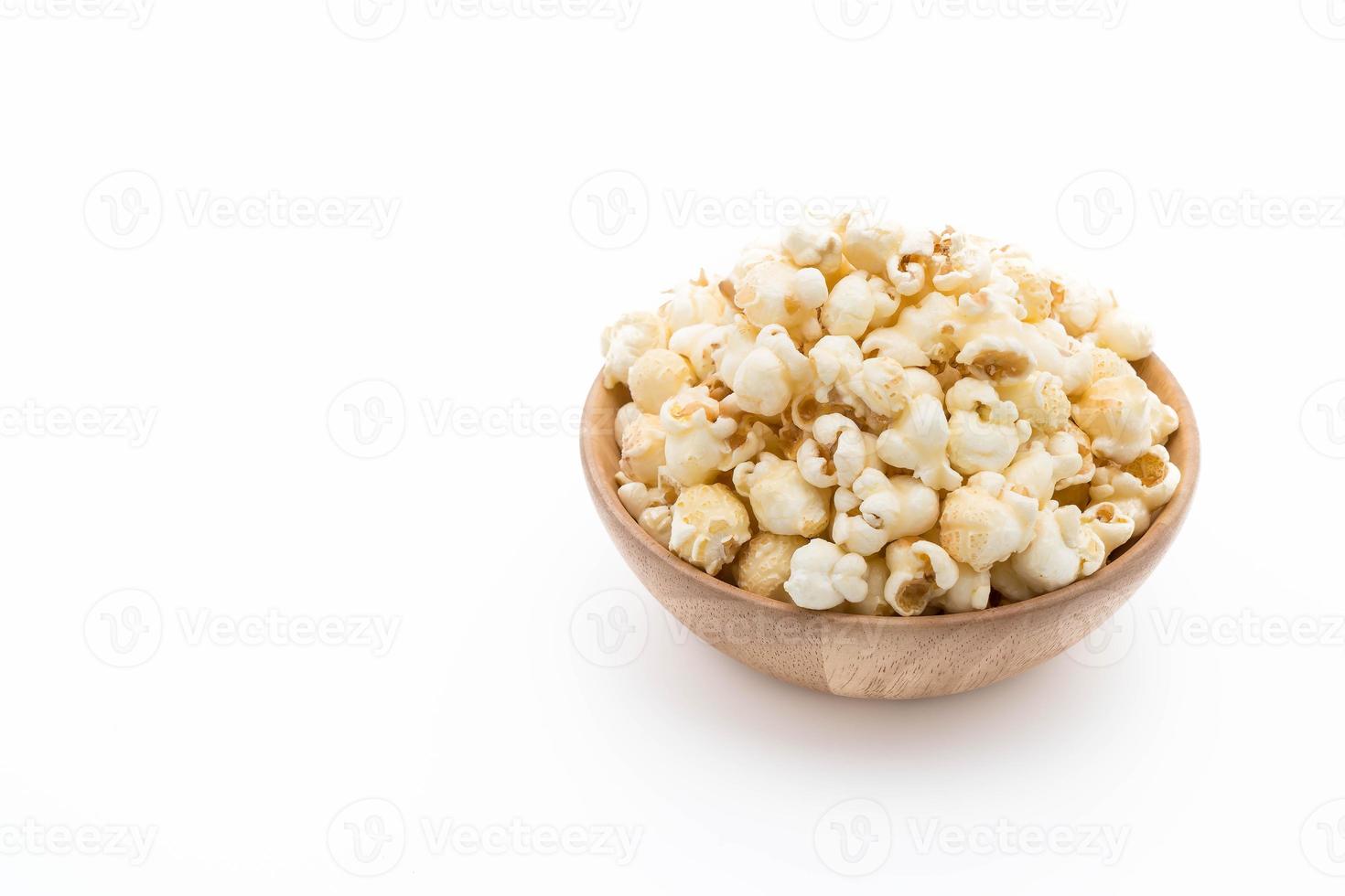 Caramel popcorn on white background photo