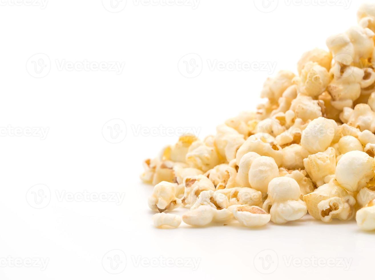 Caramel popcorn on white background photo