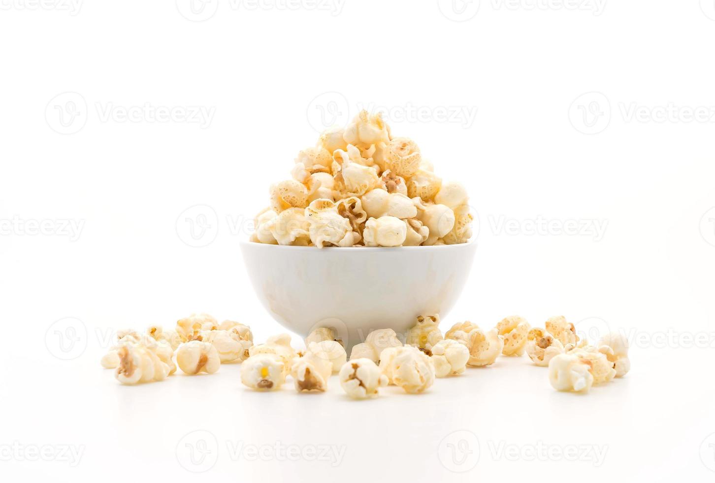 Caramel popcorn on white background photo
