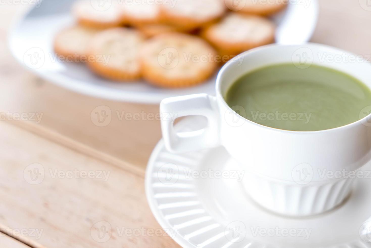 A cup of matcha latte green tea photo