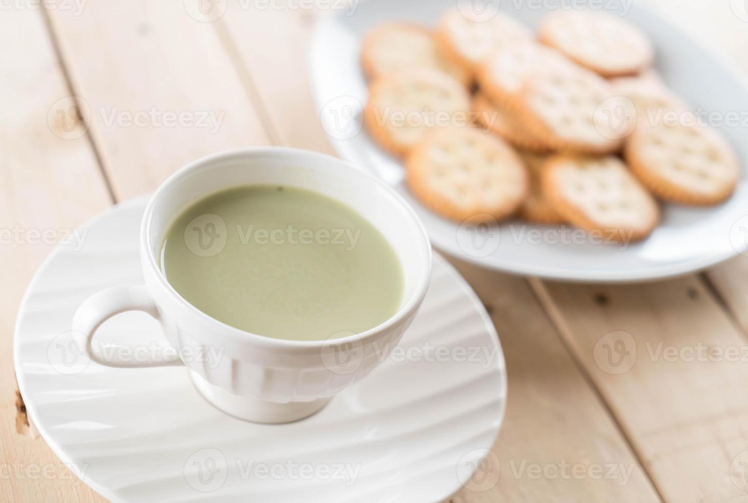 A cup of matcha latte green tea photo