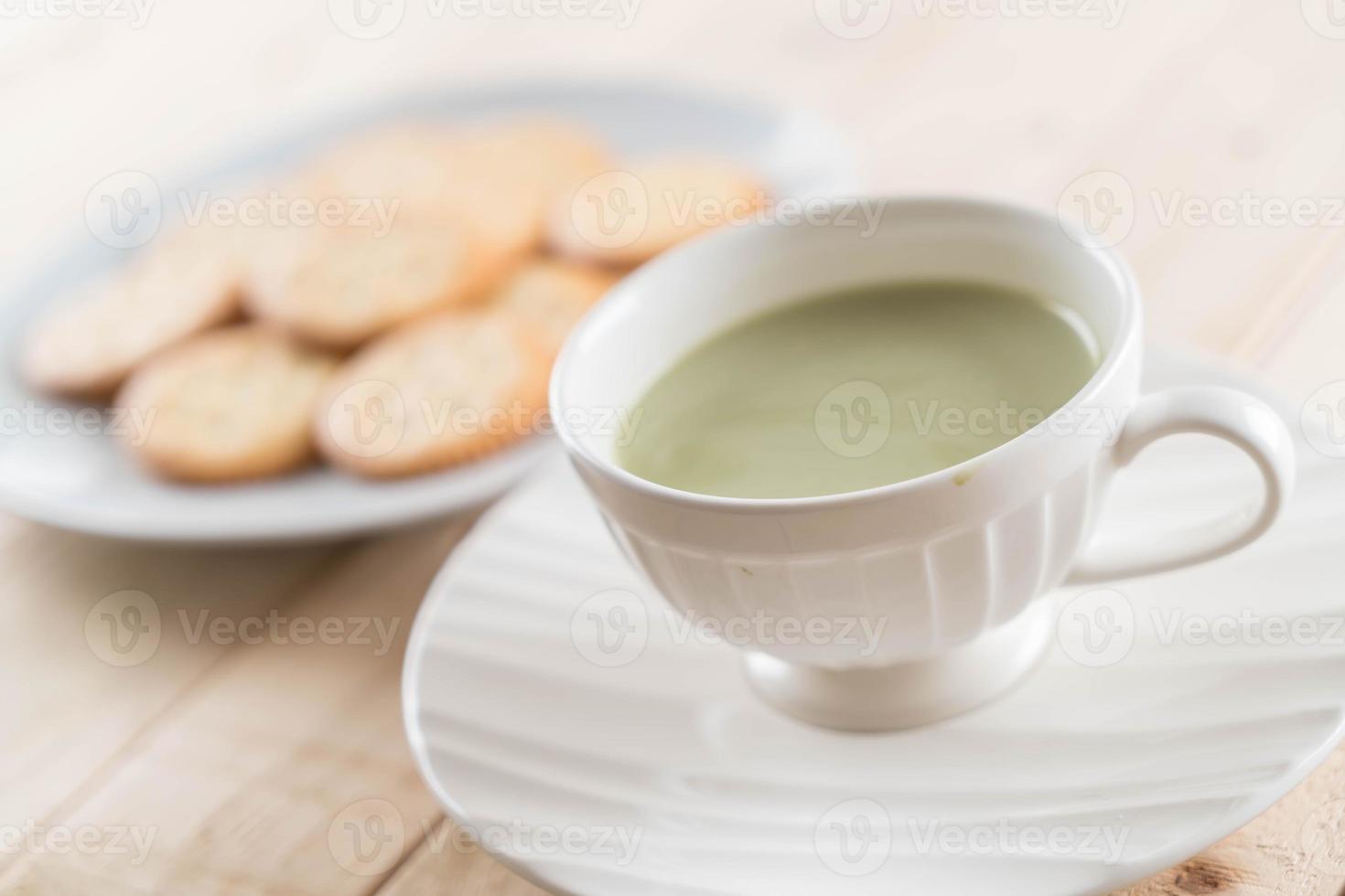 A cup of matcha latte green tea photo