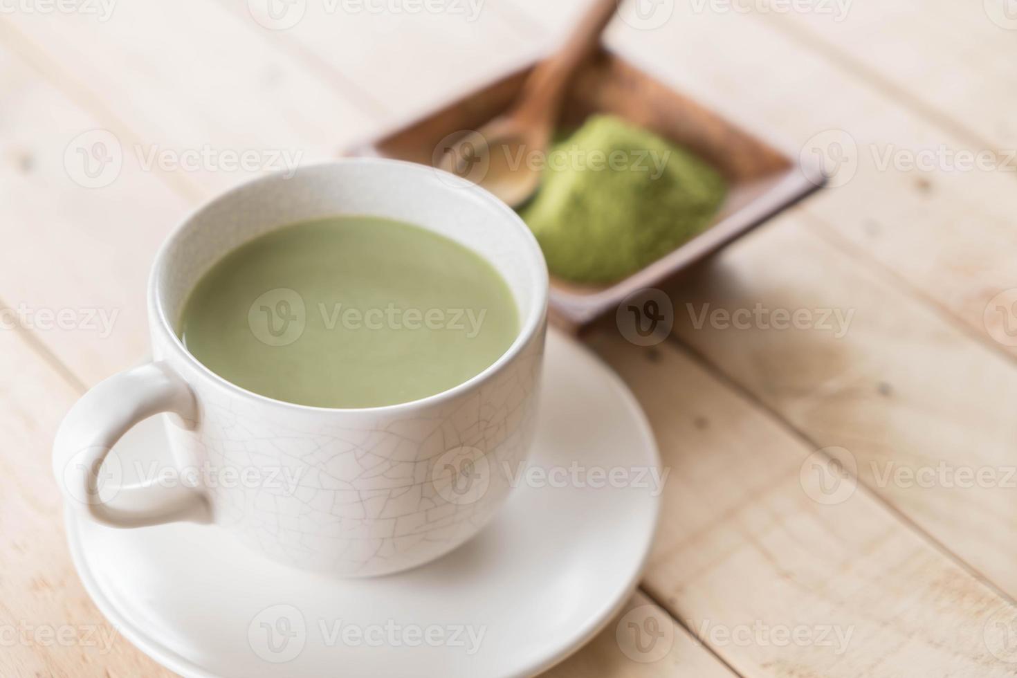 A cup of matcha latte green tea photo