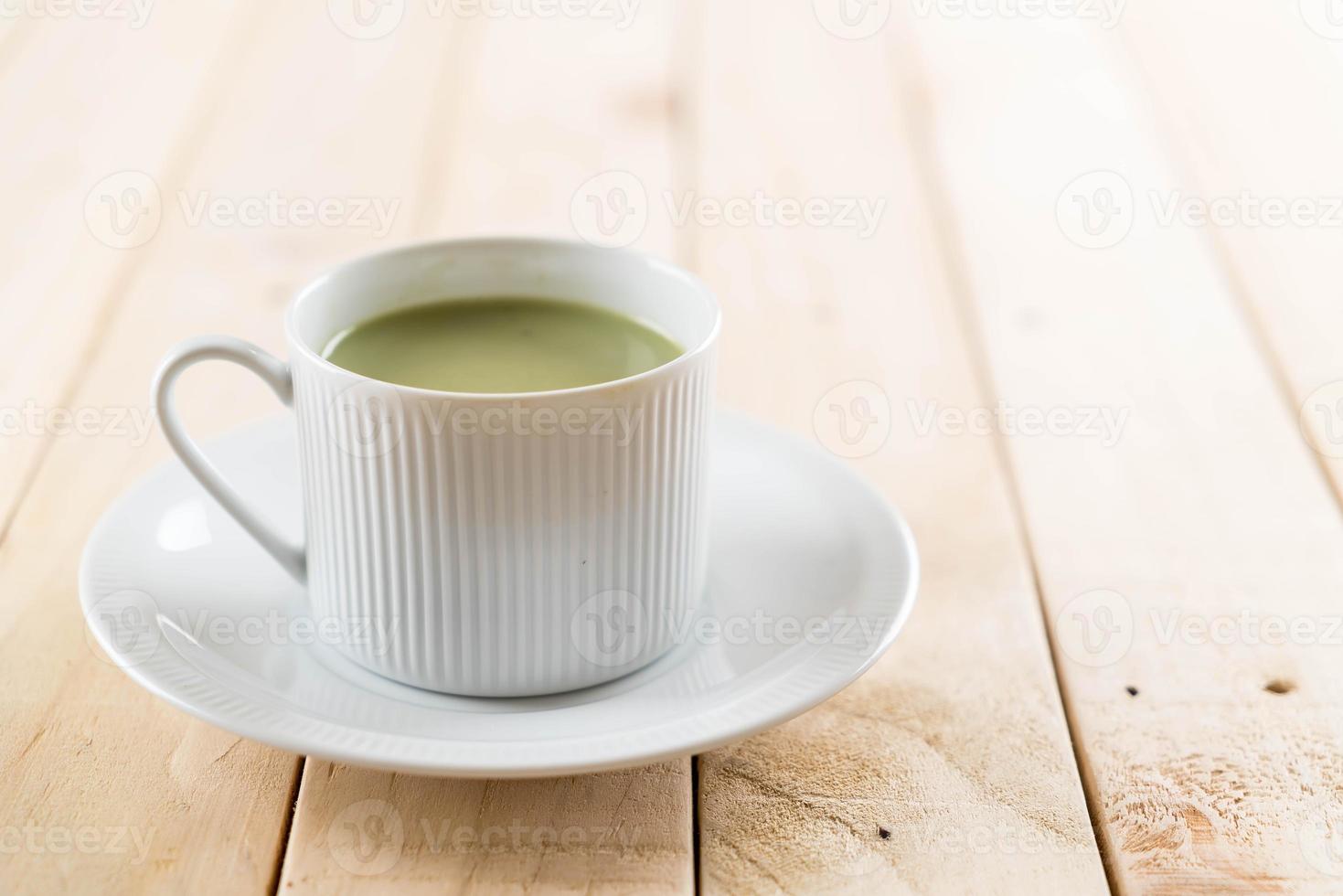 A cup of matcha latte green tea photo