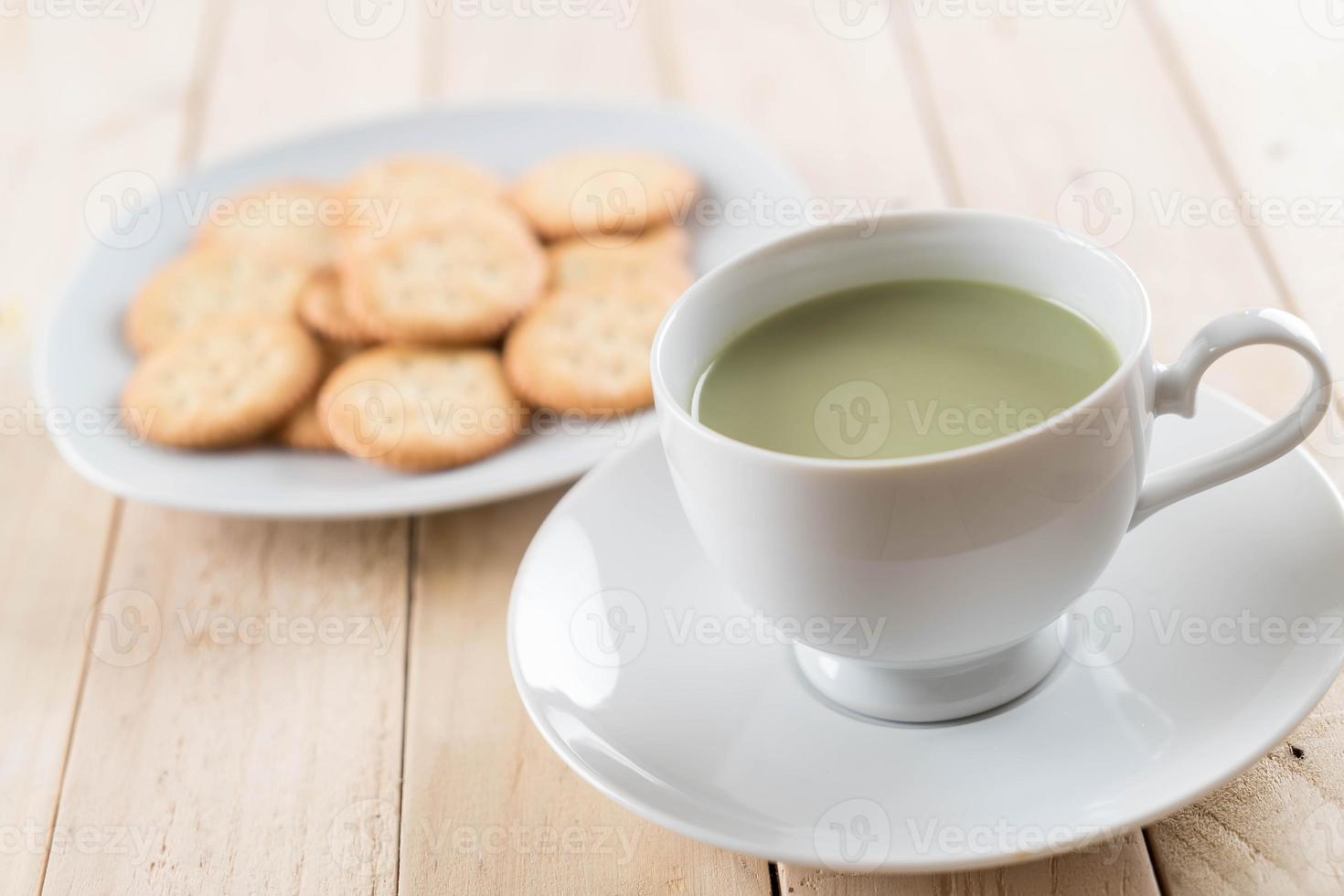 A cup of matcha latte green tea photo