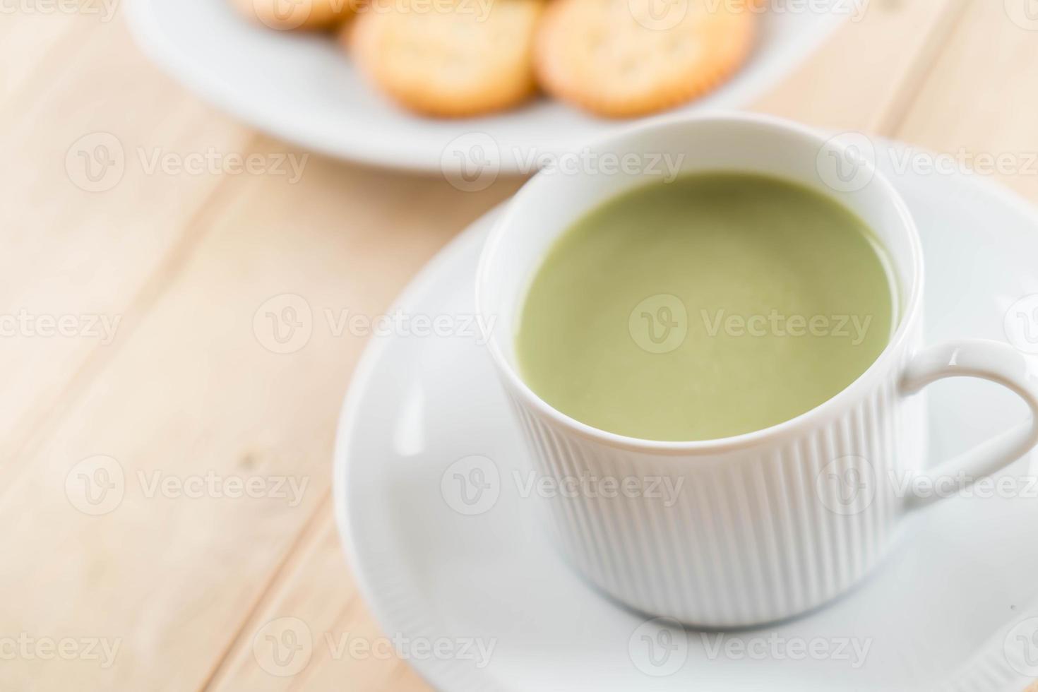 A cup of matcha latte green tea photo