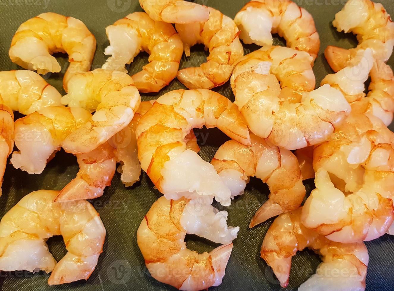 some fresh spiced and roasted shrimps photo
