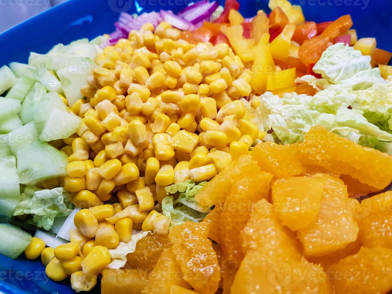 breaded and baked sheep's cheese with surimi salad photo