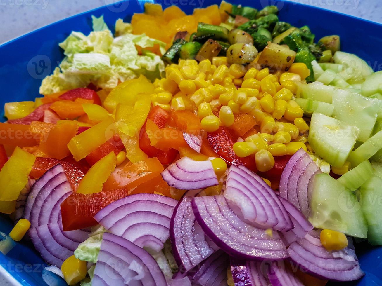 breaded and baked sheep's cheese with surimi salad photo